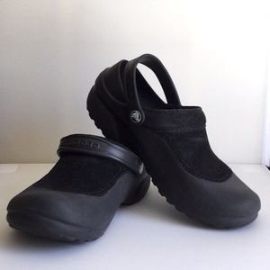 Crocs with faux suede upper panel.